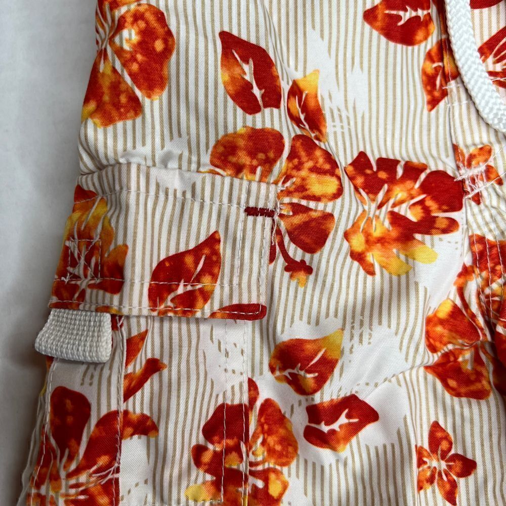3/$15 Carter’s 12 months elastic waist floral board shorts - Picture 2 of 6